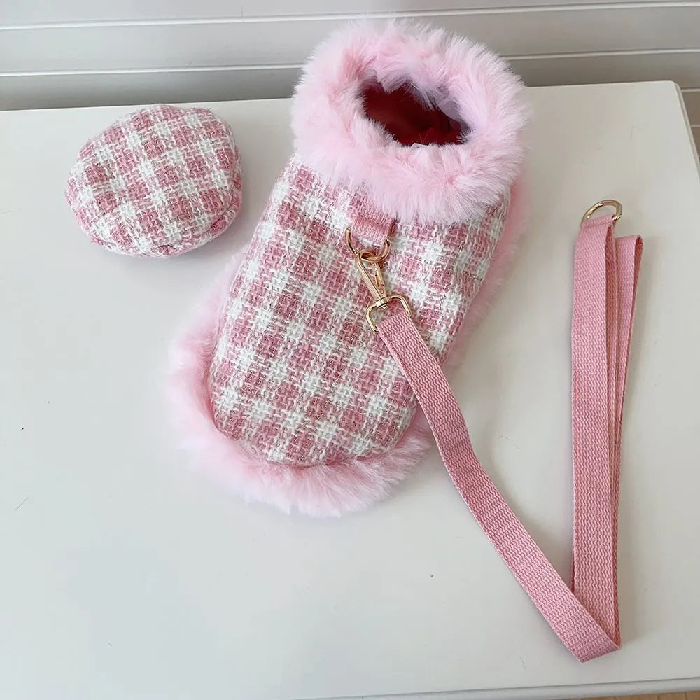 Pink polyester cat costume with a hooded beret and a matching cape on a cat