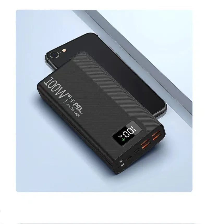 Large black and white plastic power bank showing size comparison and capacity options from 20000mAh to 50000mAh.