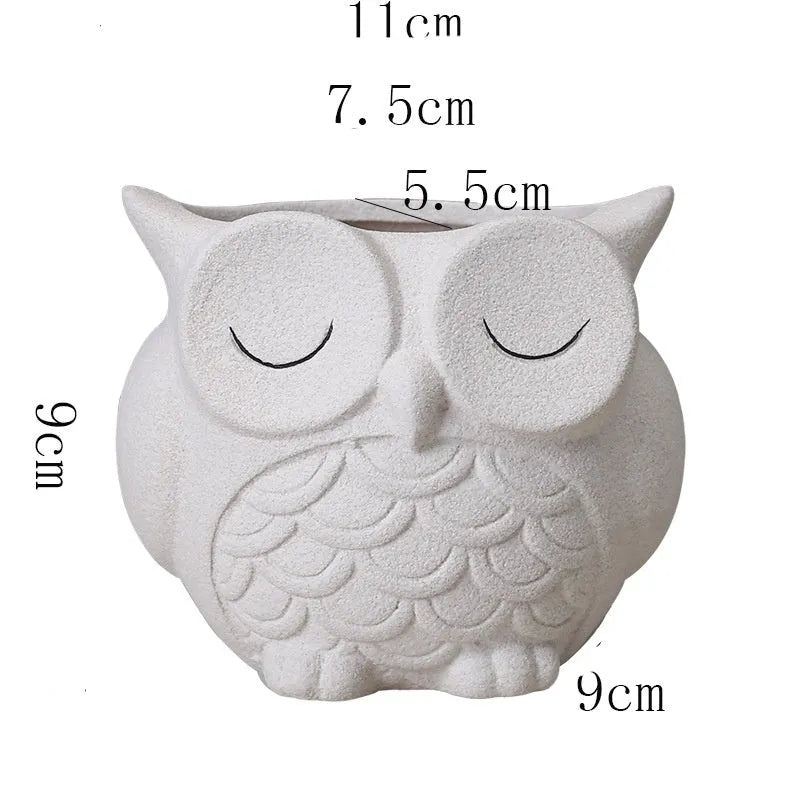 Handmade frosted ceramic owl flower pot in light pink for small succulents.