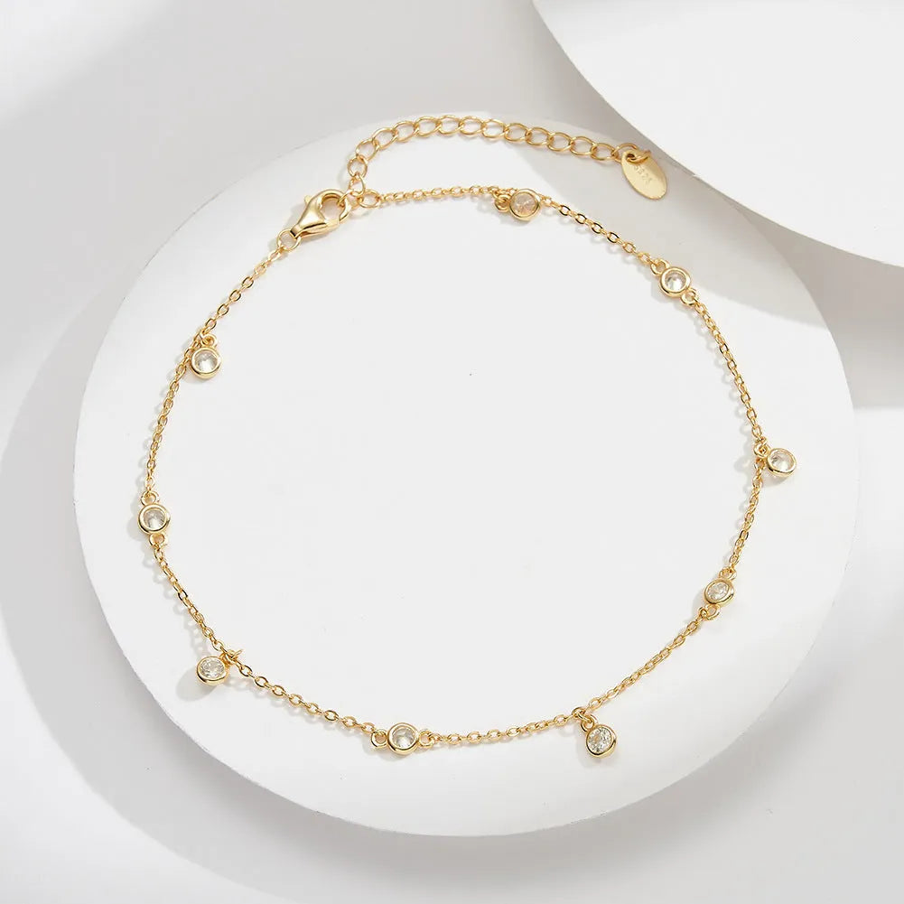Women's silver anklet with simple geometric zirconium pendant in gold finish