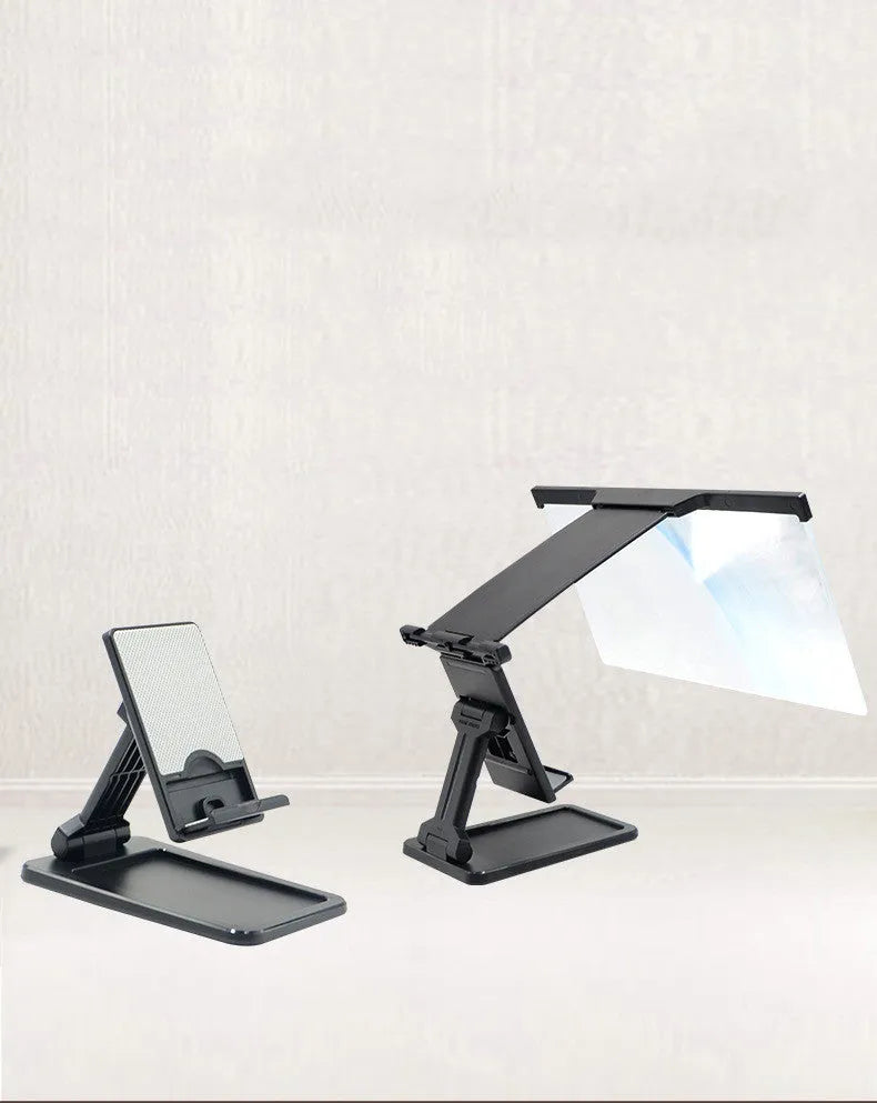 Black folding mobile phone screen amplifier with detachable holder showing 3-4x magnification