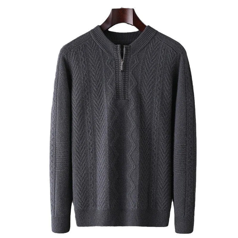 Man wearing a grey diamond pattern pure wool half zip sweater, loose fit with long sleeves.