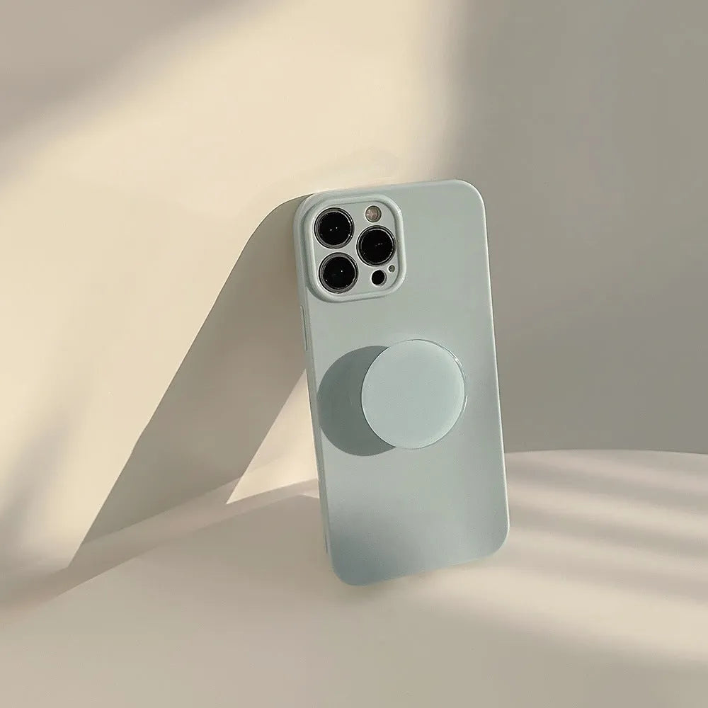 Solid colour TPU bracket phone case for iPhone with detachable kickstand, showing a back view with bracket attached