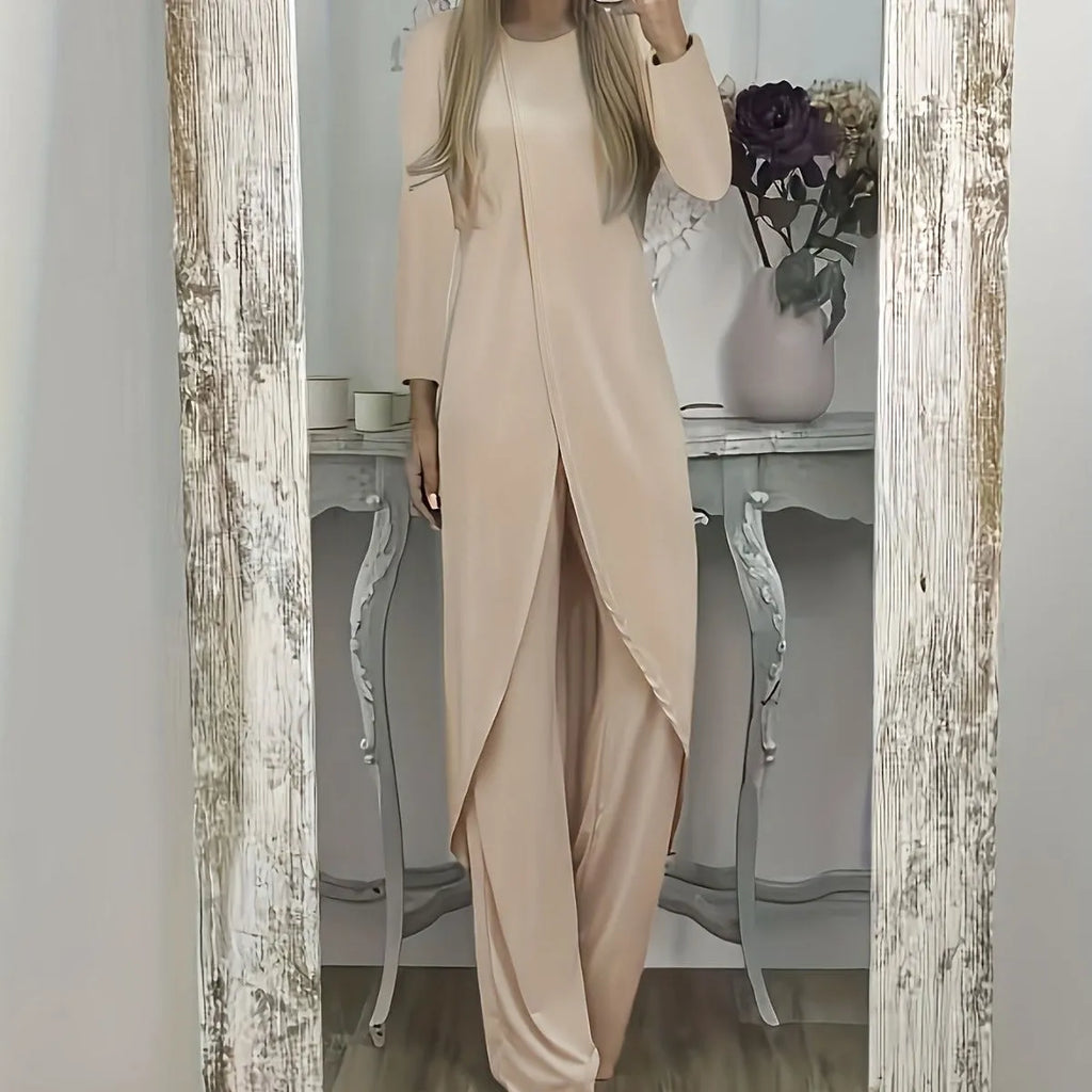 Casual long sleeve polyester two-piece lounge set in black, shown with loose round neck top and trousers.