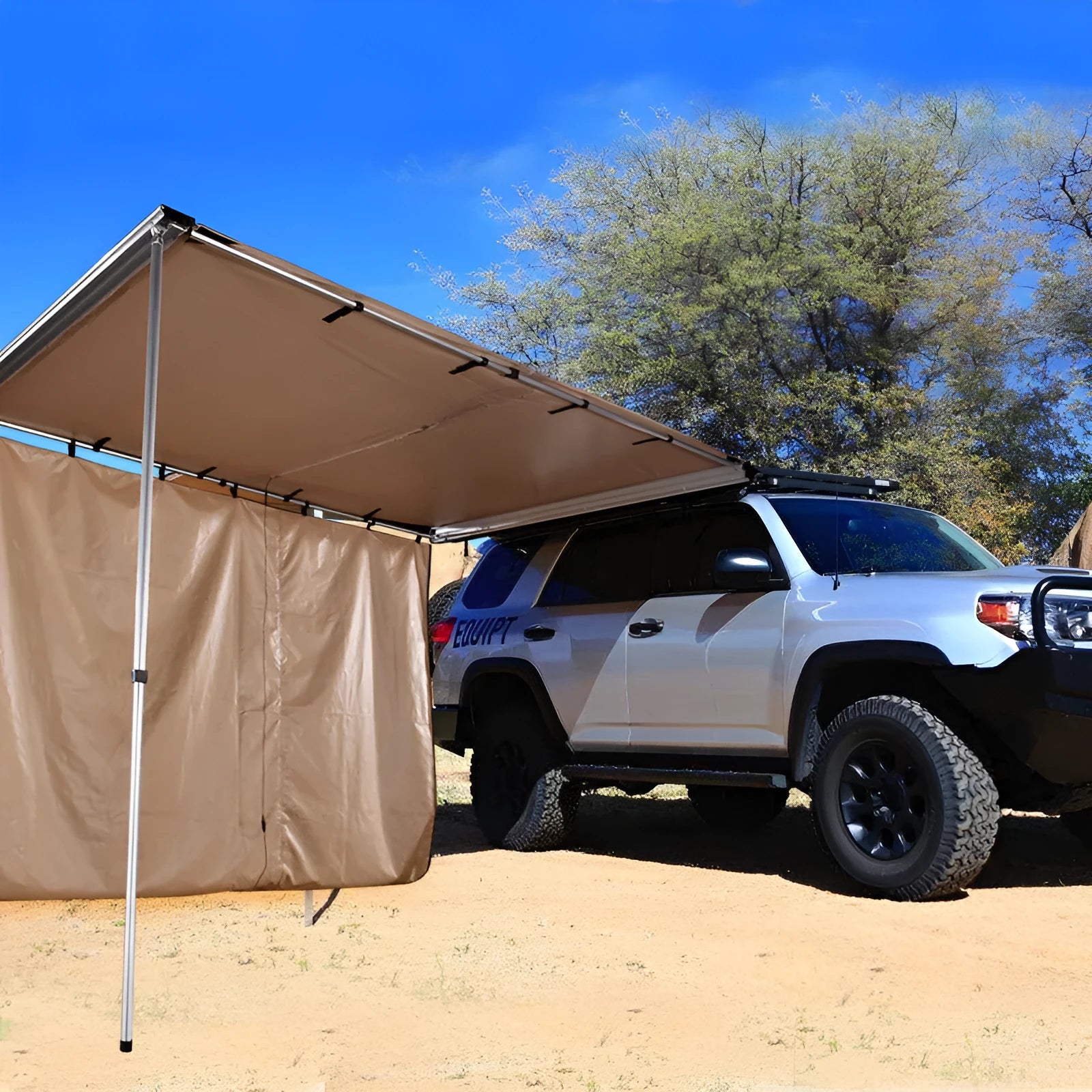 Black rainproof camping tent with aluminium poles set up outdoors, showing two-bedroom interior and Oxford cloth base.