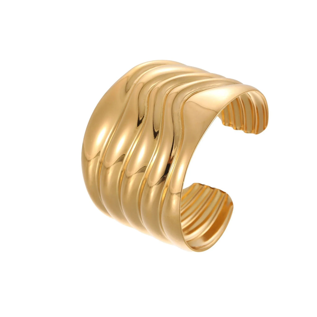 Women's gold plated stainless steel wide bracelet with wave geometric asymmetric design