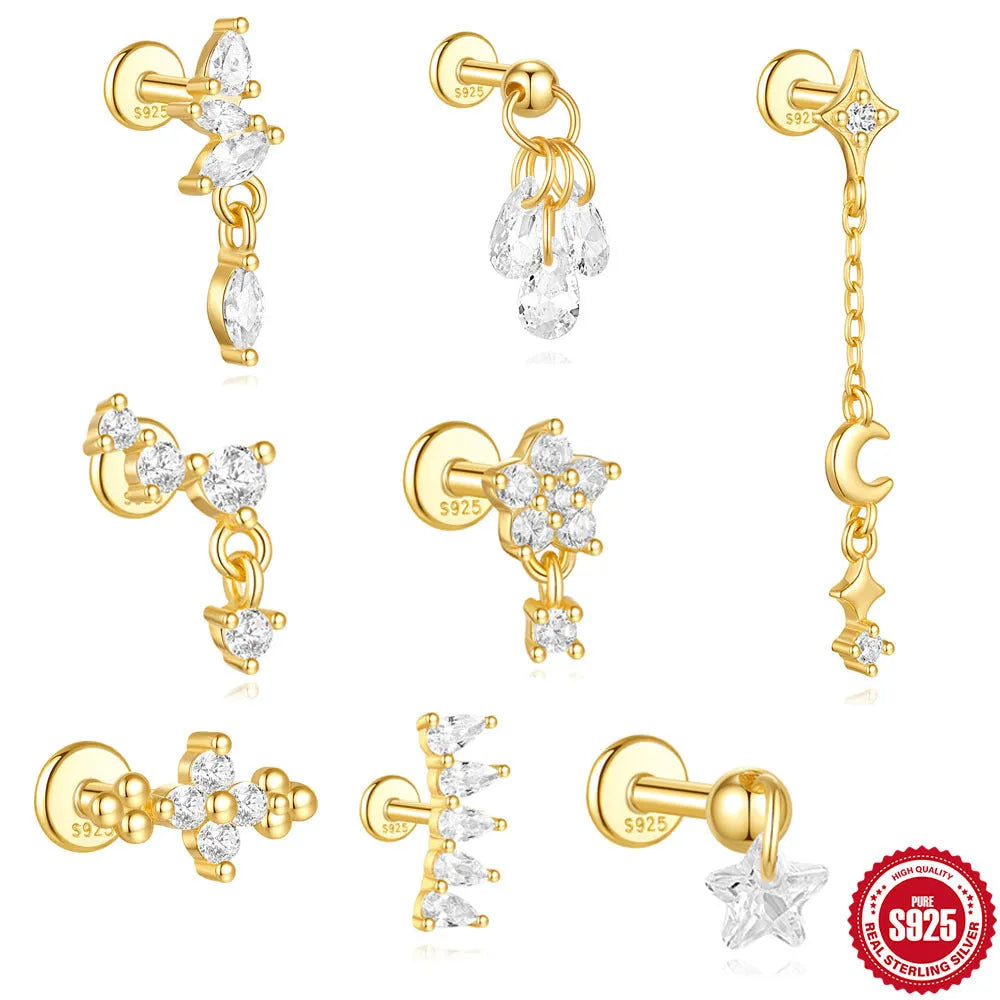 S925 sterling silver geometric moon and star earrings in a gold colour on a white background