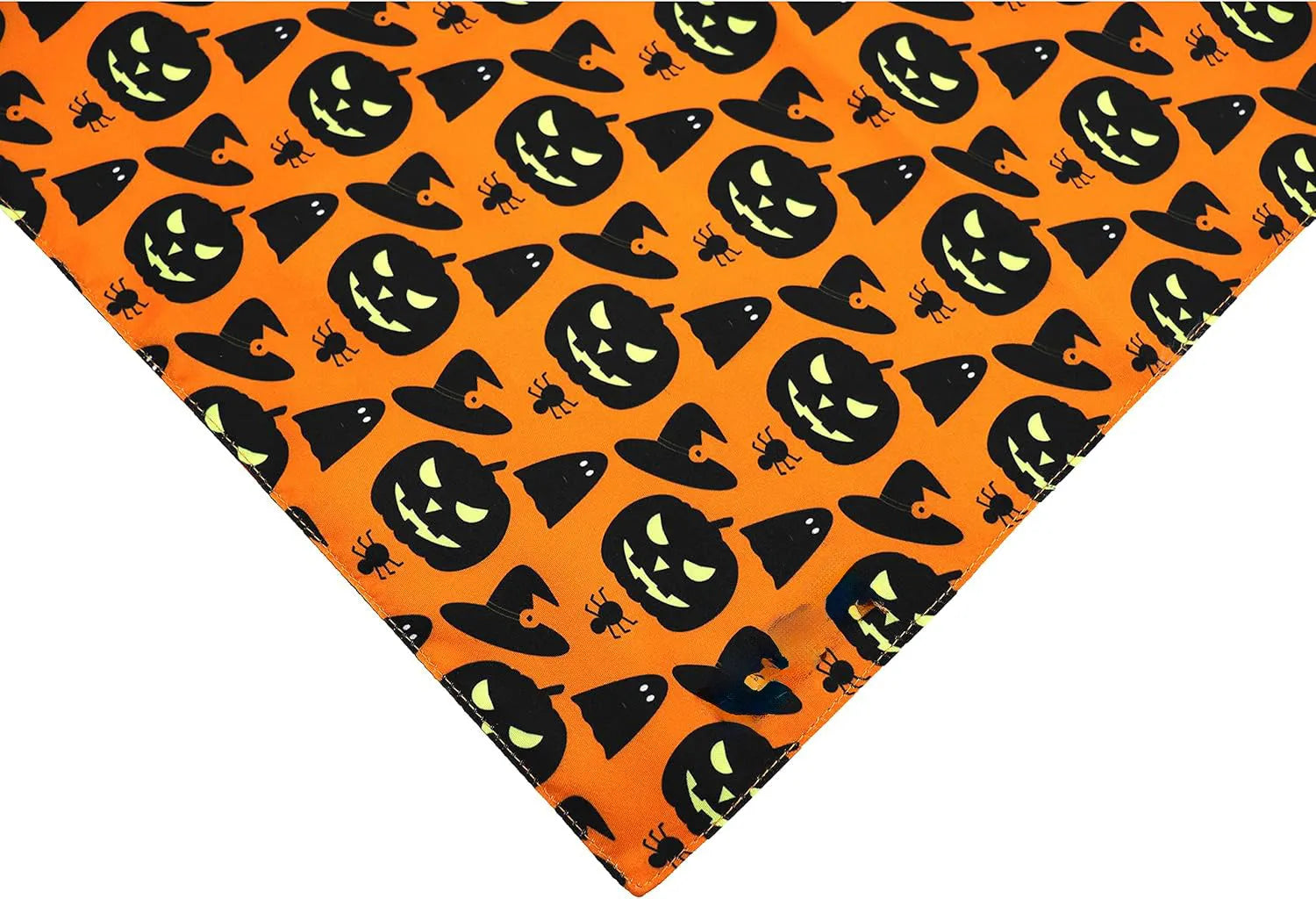 Reversible Halloween dog bandana with pumpkin and spider web designs in black and orange colours