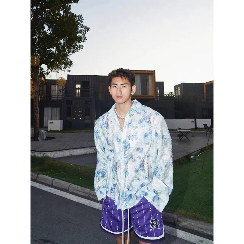 Long sleeve floral shirt with embossed three-dimensional pattern in polyester blend fabric available in pink or blue