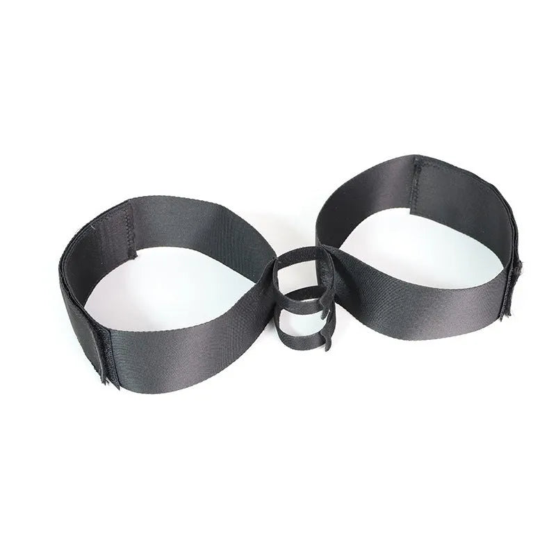 Black knitted adult toy strap for securing sensual accessories
