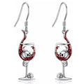 Geometric zinc alloy dangle earrings featuring a detailed Halloween skull charm with an electroplated metallic finish.