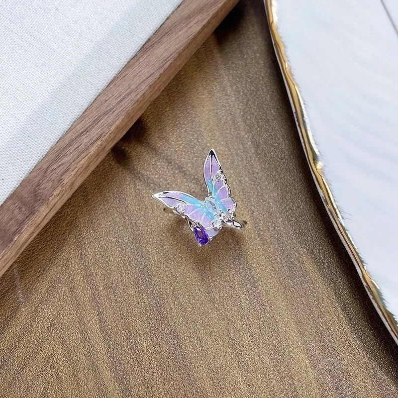 Adjustable copper ring with detailed insect sculpture and drip-oil finish in colour option JZ2868A.