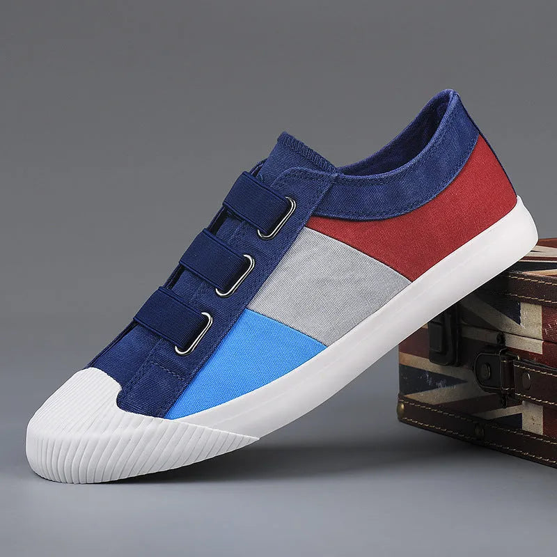 Men's low-top canvas sneakers with elastic band closure in a beige colour variant.