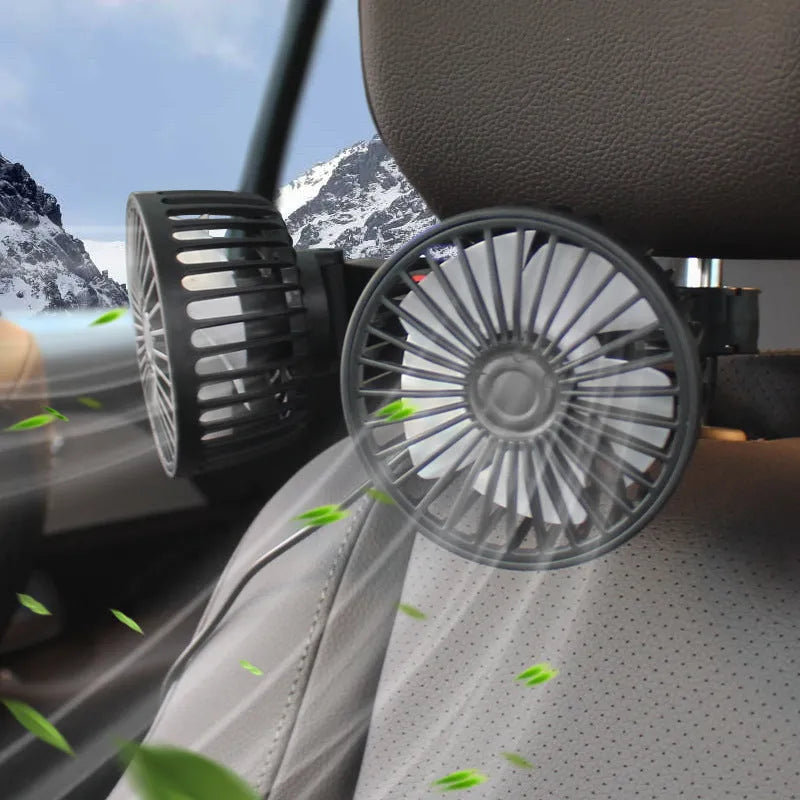 Black USB-powered car rear seat fan mounted on headrest with adjustable controls