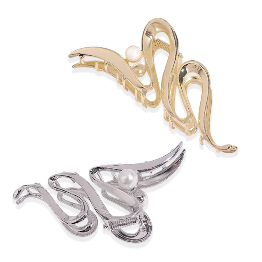 Electroplated silver metal hair barrettes in various designs including cross, wave, and bow shapes.
