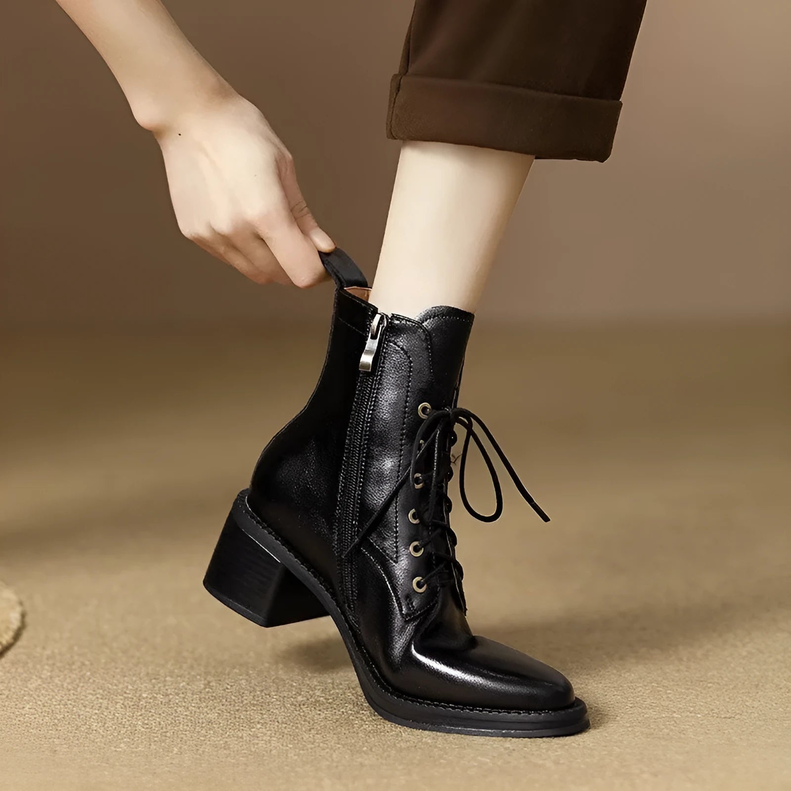 Women's black pointed-toe short tube boots with 5.5cm heel and velvet detailing on artificial PU upper