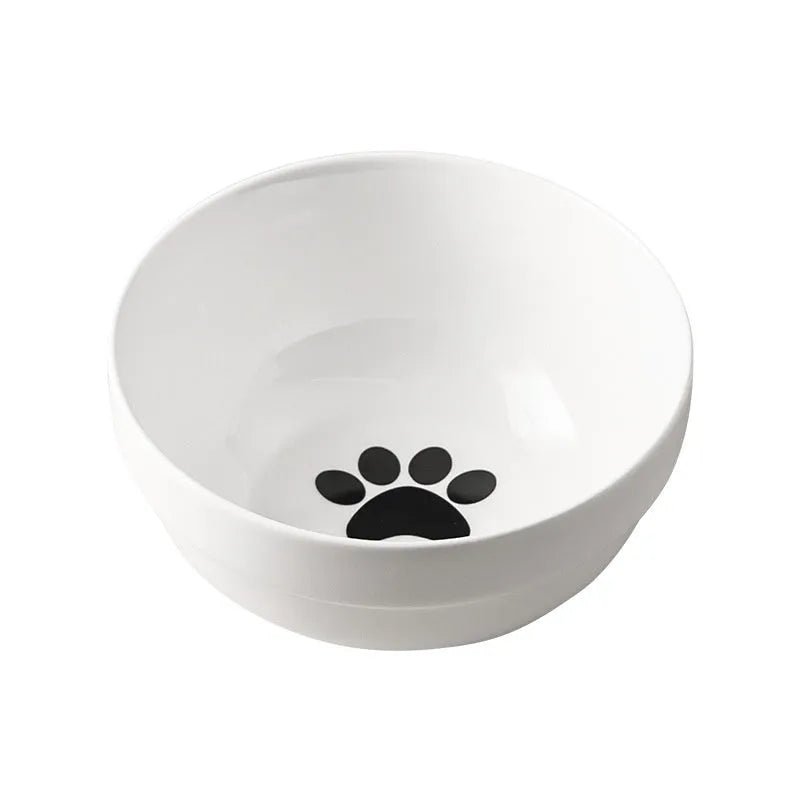 White ceramic cat bowl with decorative pattern and black iron frame support