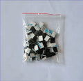 Black PA66 nylon wire management clips for automotive and electronic cable organisation