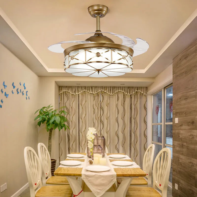 Gold 42-inch ceiling fan light with invisible blades and remote control on a white background.