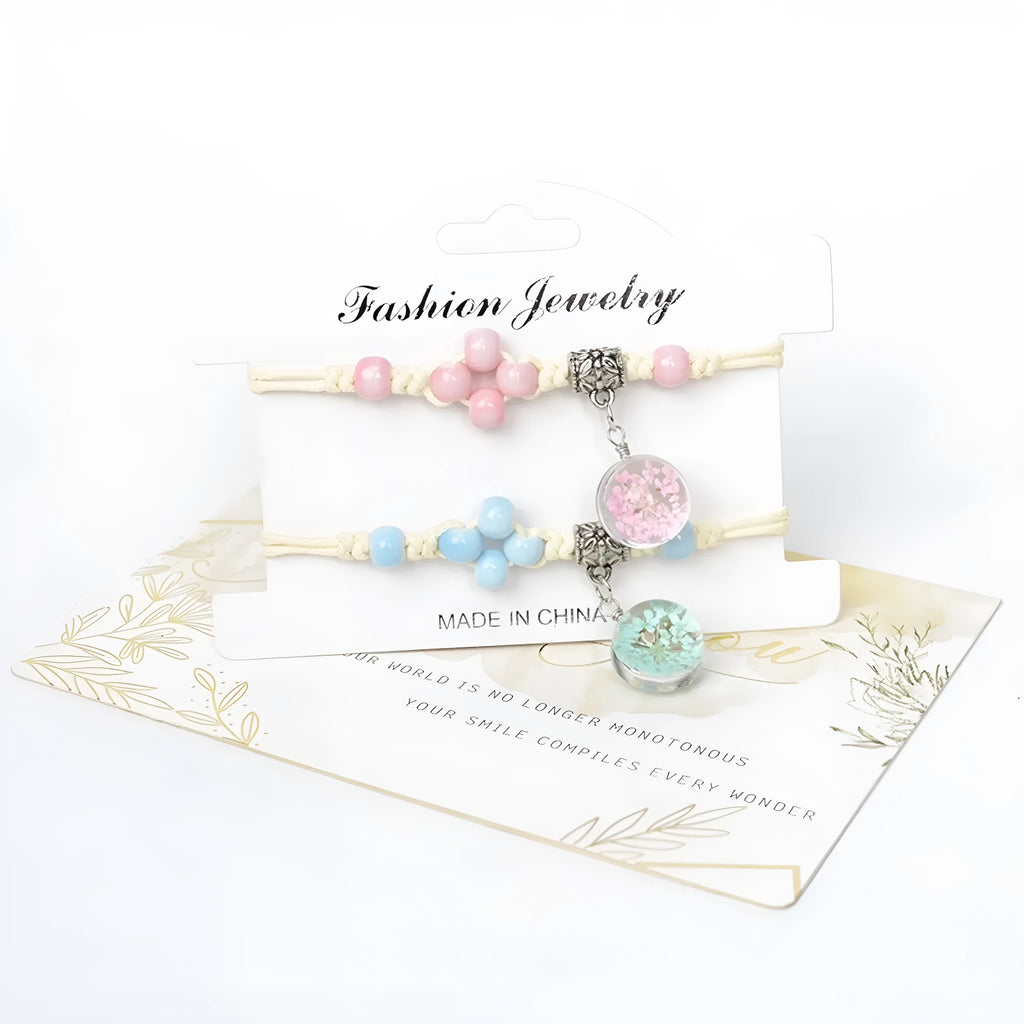 Glass bracelet with dried flowers inside 1.4cm beads on lace-style band in multiple colour options