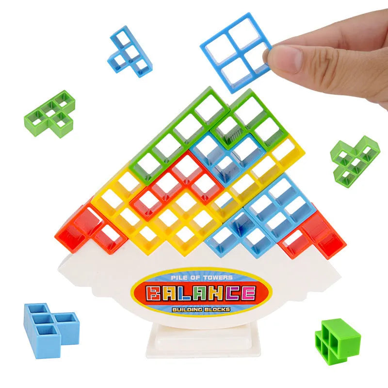 Balance stacking game with 16 plastic building blocks, chassis, and base on a table