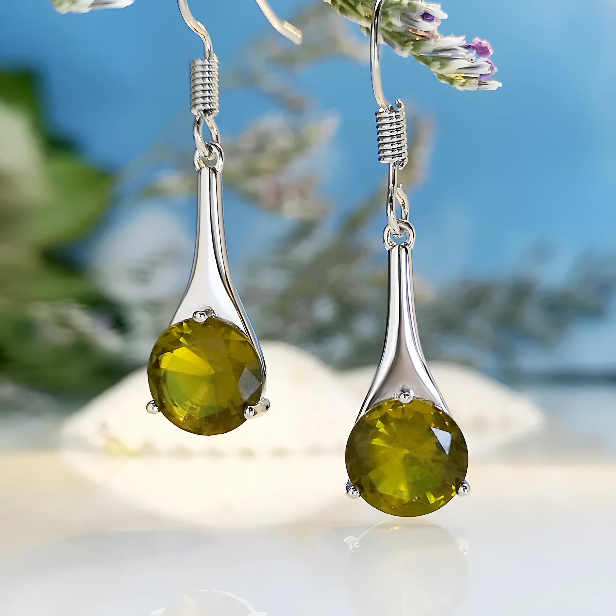 Olive green topaz drop earrings with water drop shape design and alloy construction
