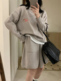 Women's knitted sweater and shorts suit with animal embroidery in imitation cashmere fabric