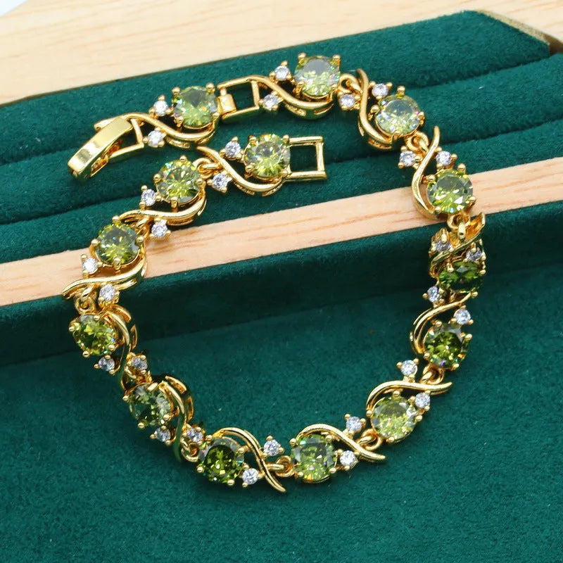 Full rhinestone zircon women's jewellery set with necklace, earrings, and ring on a snake bones chain.