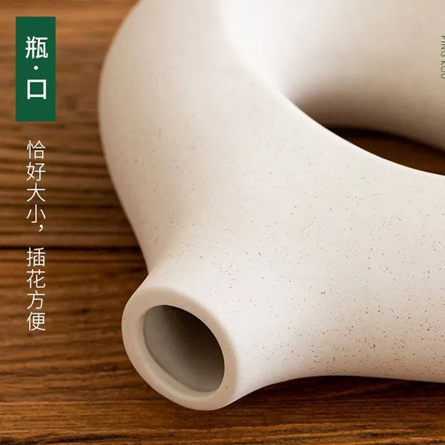 Ceramic circle vase second generation with coloured glaze finish, white large size, on a plain background
