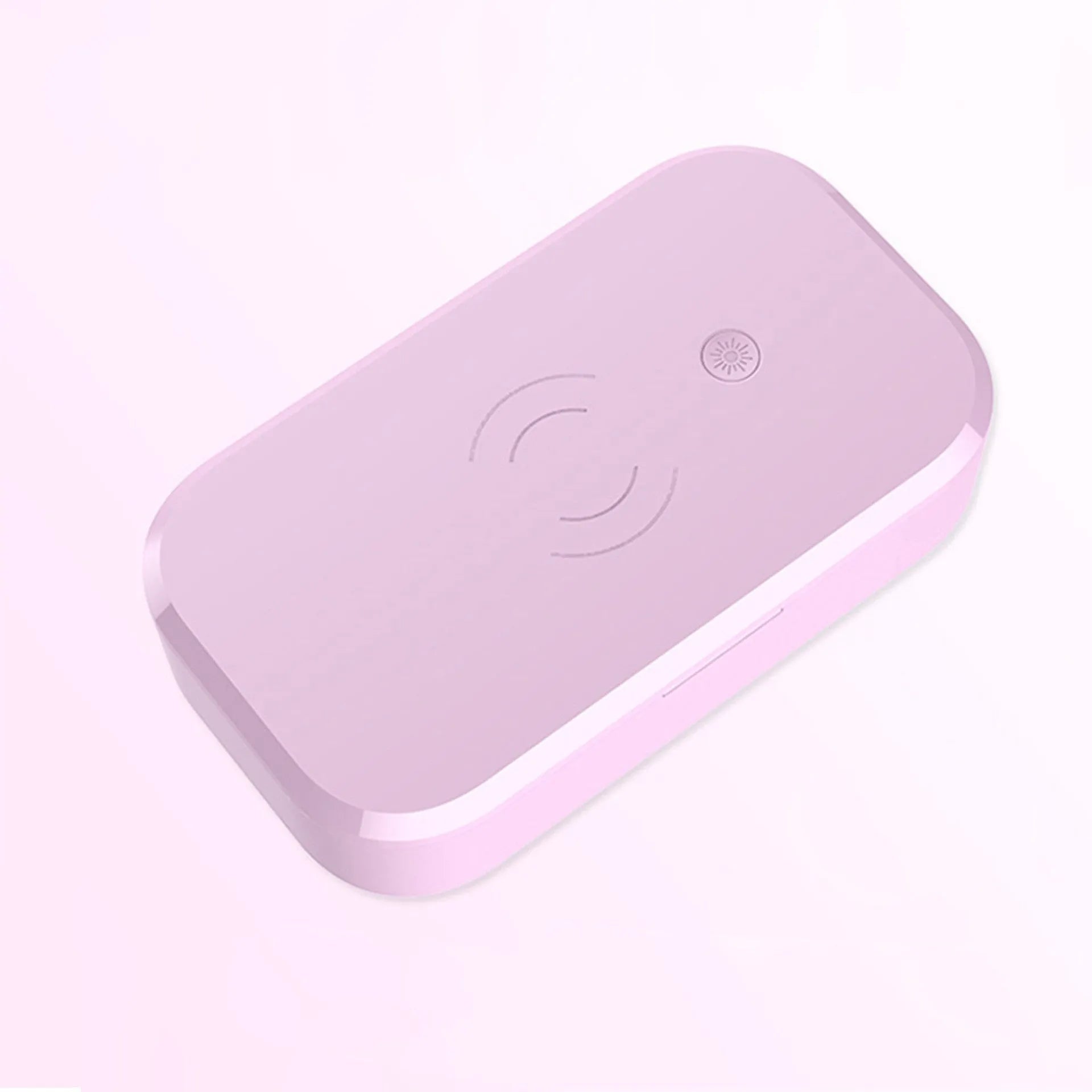 Compact white ultraviolet disinfection box with wireless phone charging pad on top.