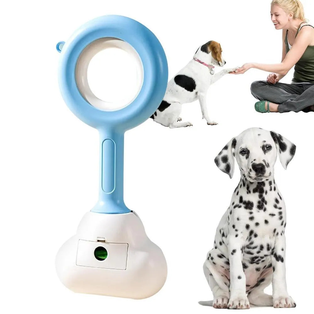 Blue cloud shape jaw dog pooper scooper on a lawn