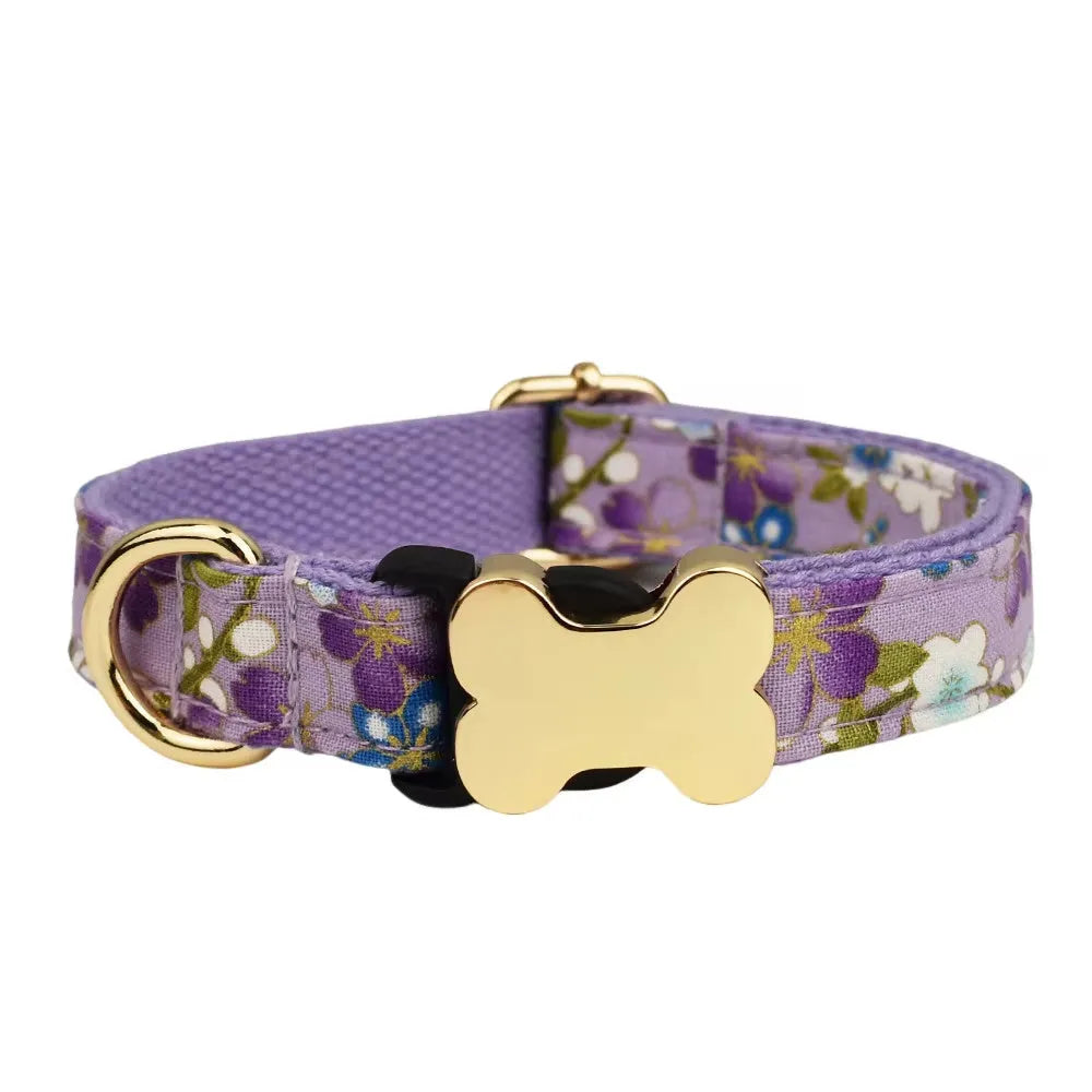 Nylon dog collar with bone-shaped buckle and grid print in multiple colours.