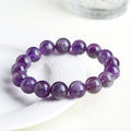 Natural feather amethyst Snow Mountain purple crystal bracelet with geometric beads and Ruyi symbol.