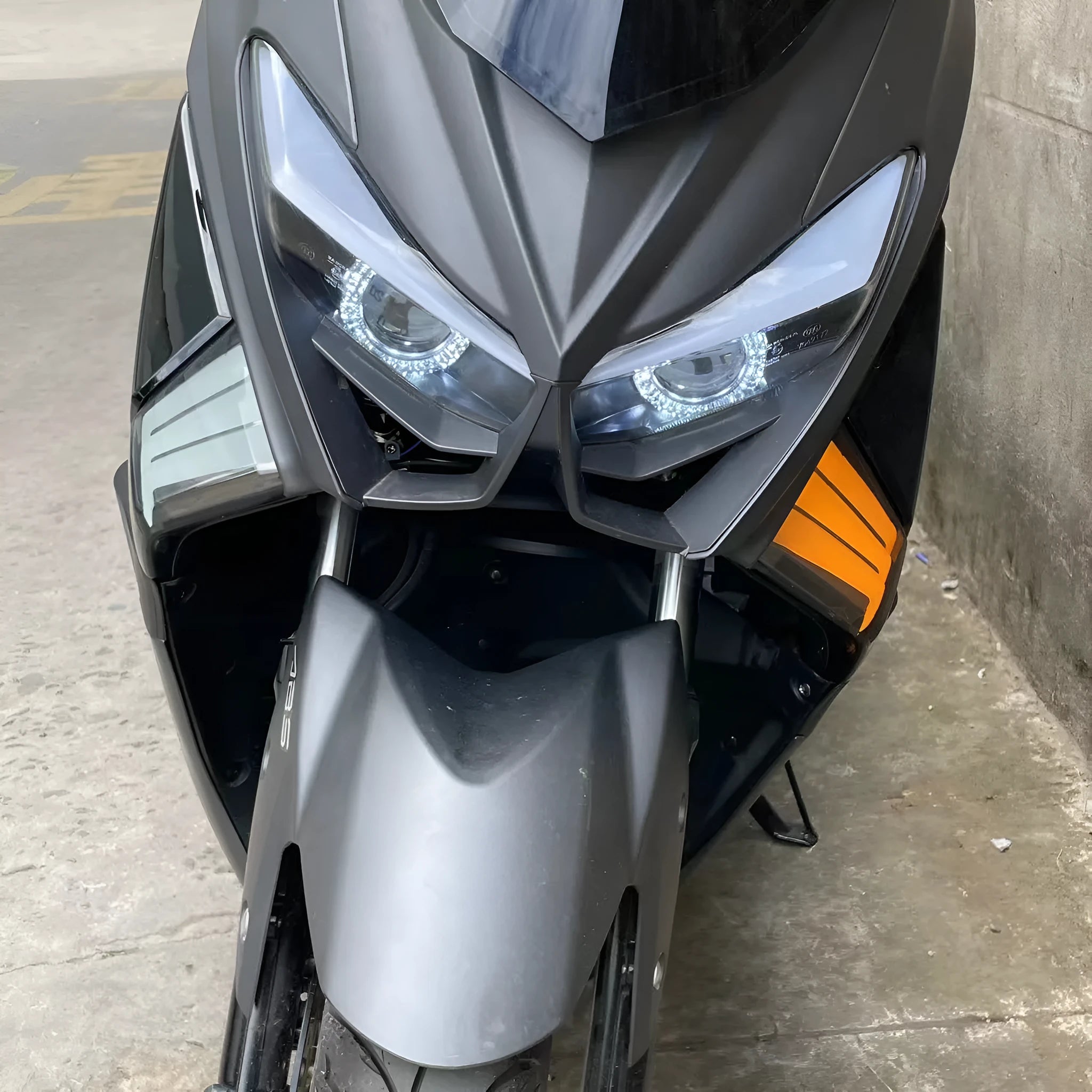 Two yellow LED cornering lamps for Tianying TS150 motorcycle on a white background.