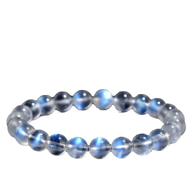 Natural cream body blue moonlight crystal bracelet with grinding finish on wrist