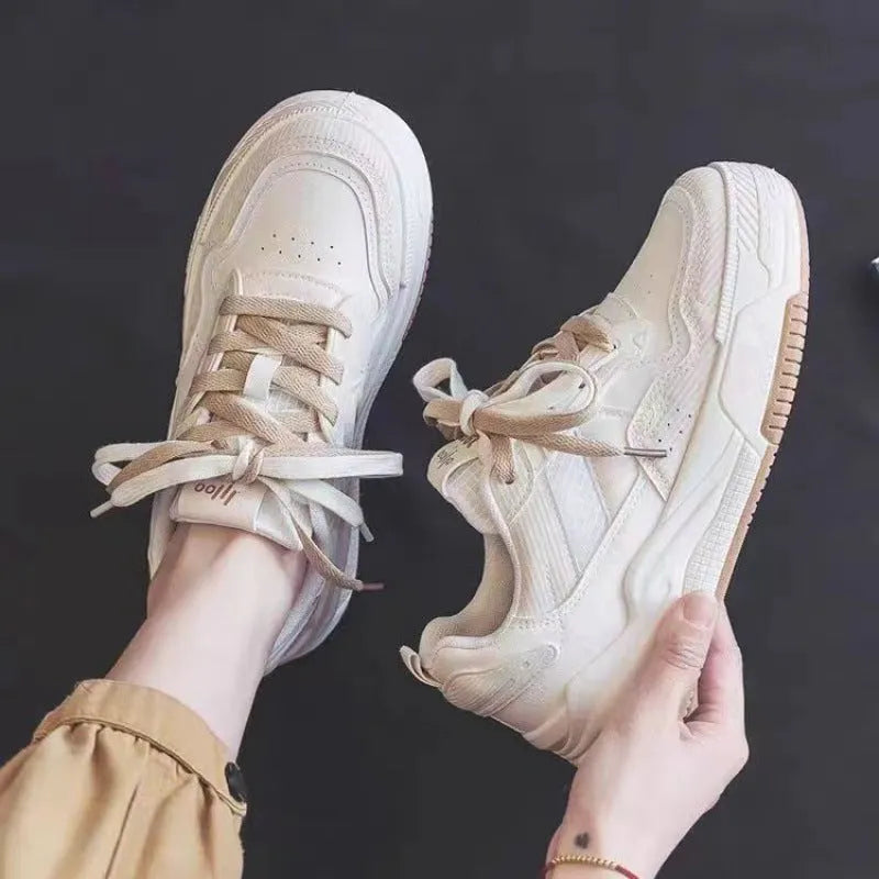 Women's low-top rubber sole sneakers in pink and white with height increase function