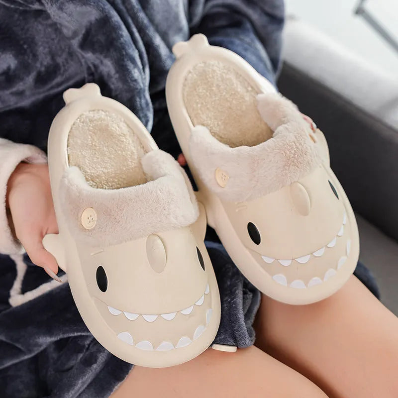 Winter shark button EVA house slippers in haze blue with sewing thread detail on indoor floor