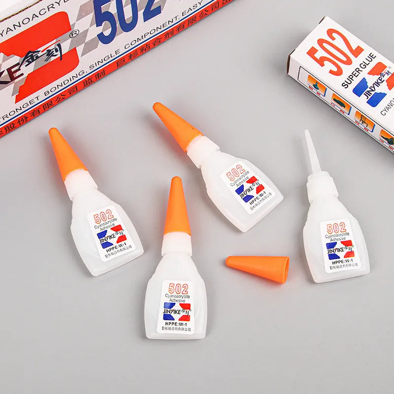 Tube of instant strong adhesive glue for specialised shoe sole and heel repairs.