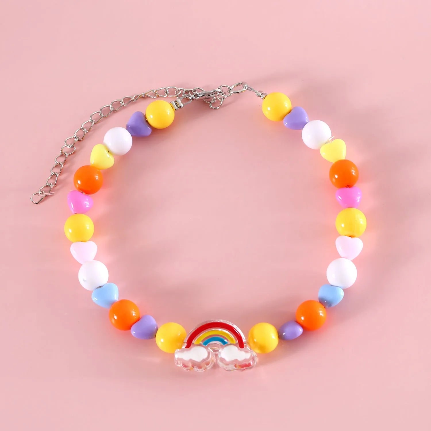 Adjustable colourful bead cat necklace in small flower, rainbow, or peach design on a white background.