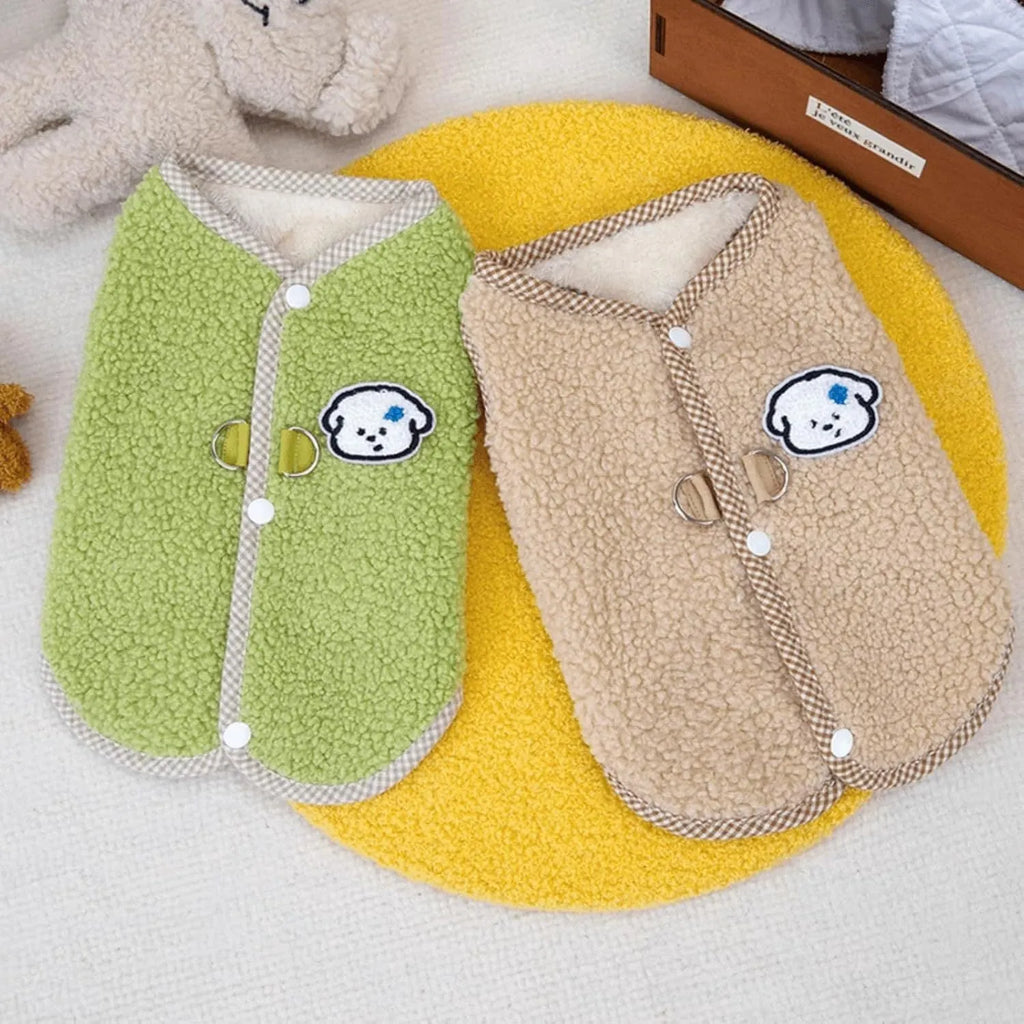 Green coral fleece dog vest with a metal leash ring on the back for a small dog.