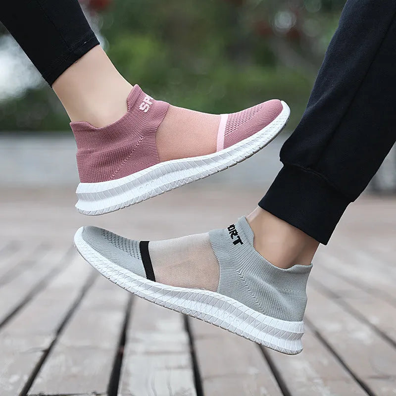 Flyknit breathable sock shoes in low-top lace-up design with round toe and tassel details