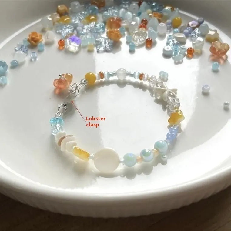 Women's alloy bracelet with diamond shape design in water-soaked orange seaside colour