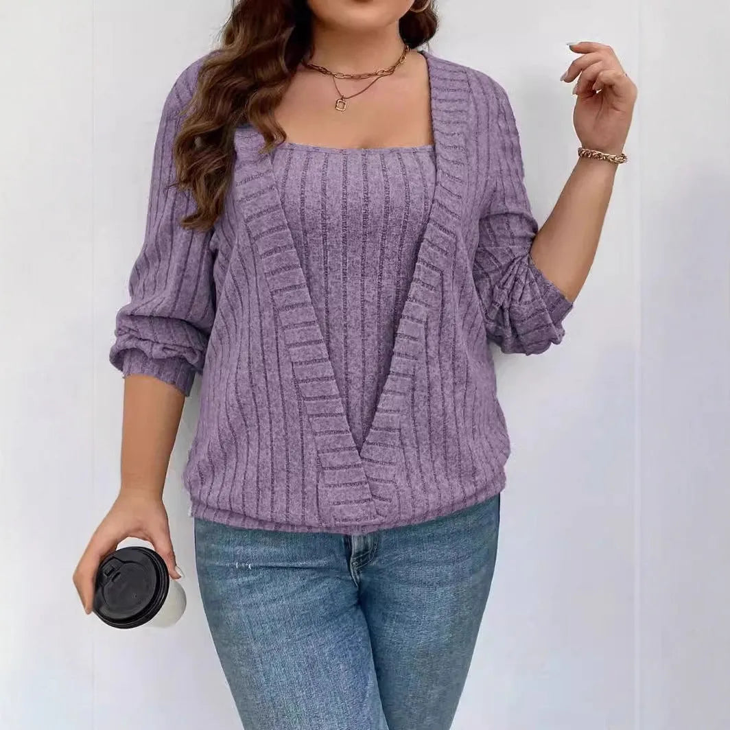 Women's solid colour V-neck long sleeve false two-piece suit in a loose ribbed fabric.