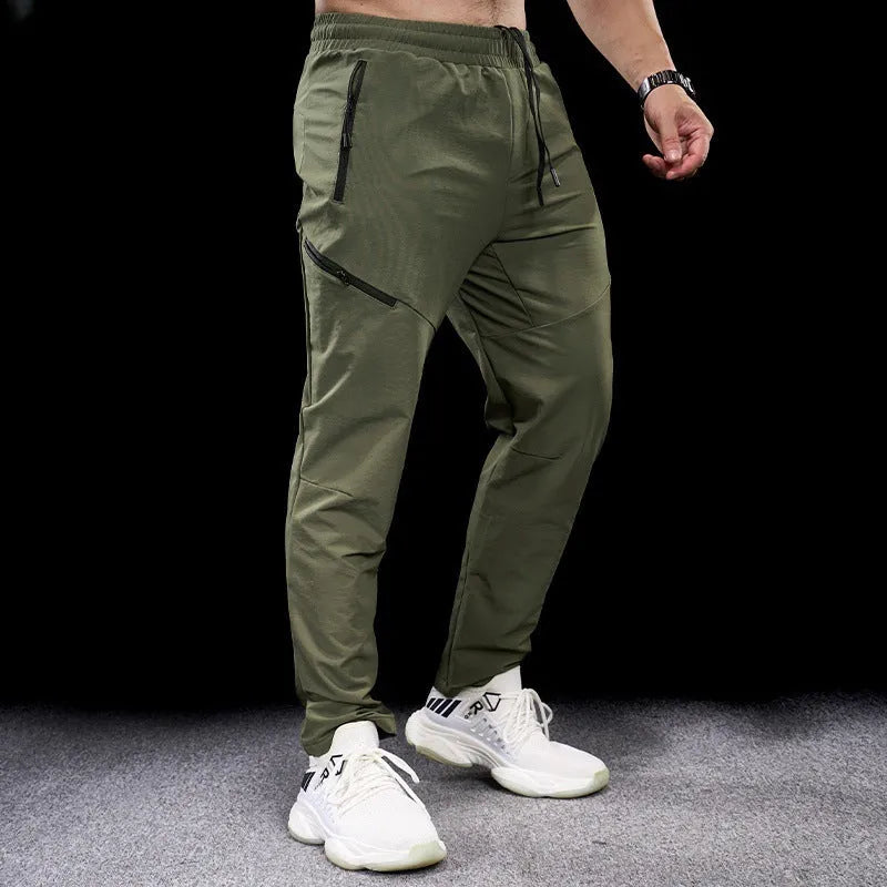 Men's waterproof quick-drying nylon workout trousers with elasticated mid-waist in multiple colour options