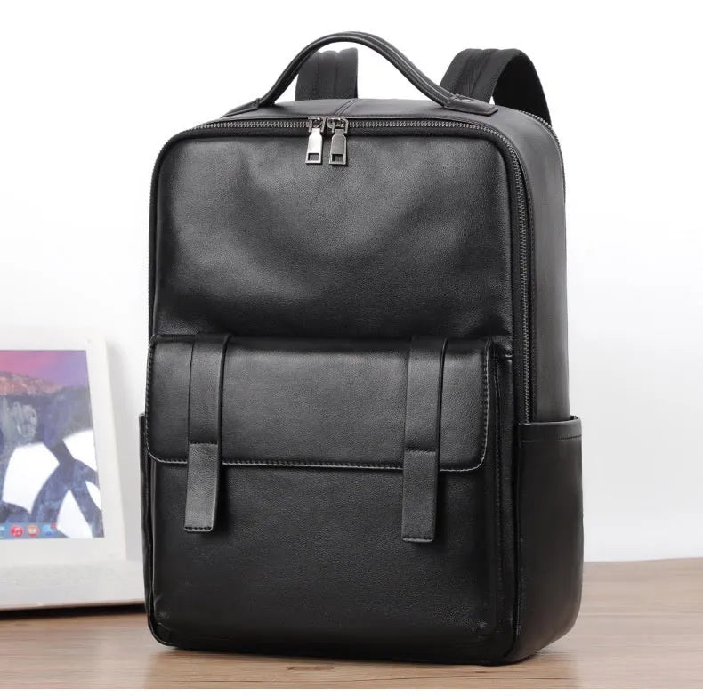 Black genuine leather men's computer backpack with woven details, shown open