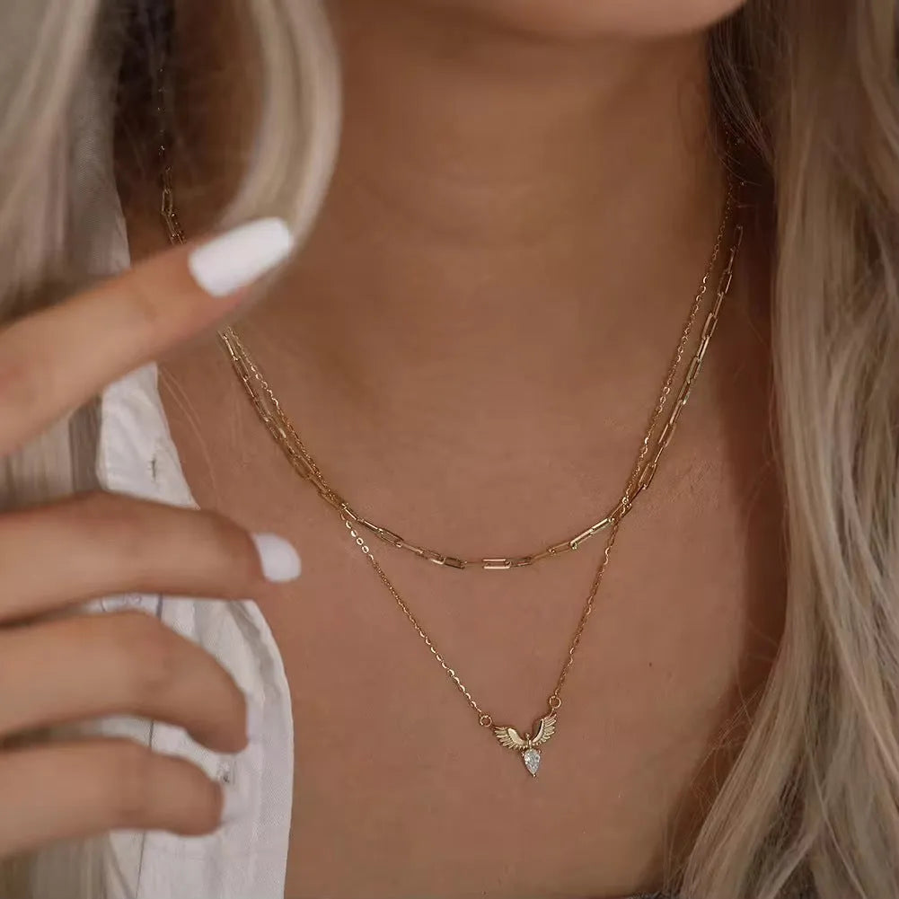 Silver necklace with eagle pendant on O-ring chain in white gold or yellow gold finish