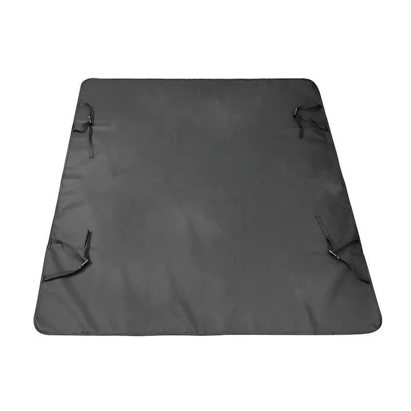 Grey dog bone print water resistant car pet mat measuring 140x110cm on a car rear seat.