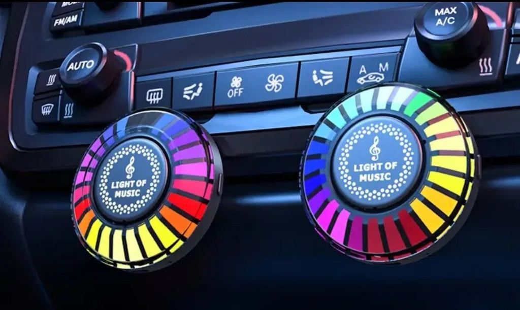 3D pickup RGB car atmosphere light mounted on a car air vent for aromatherapy and mood lighting.