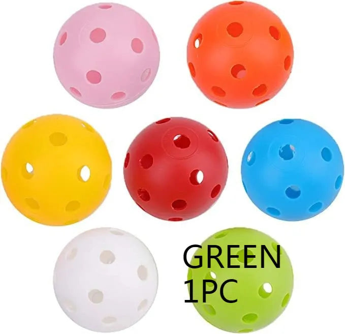 Multi-colour golf practice balls in net bag with 26-hole putting layout for skill development