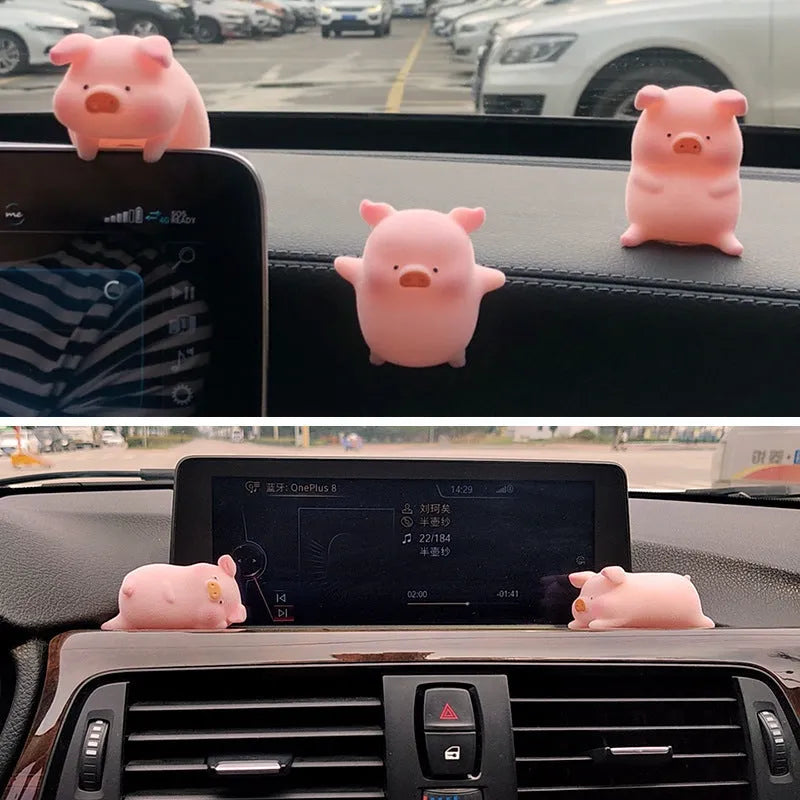 Cartoon pig character resin car ornament for dashboard or windscreen decoration.